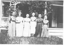 SA0211 - Six unidentified Shaker women in front of a house., Winterthur Shaker Photograph and Post Card Collection 1851 to 1921c